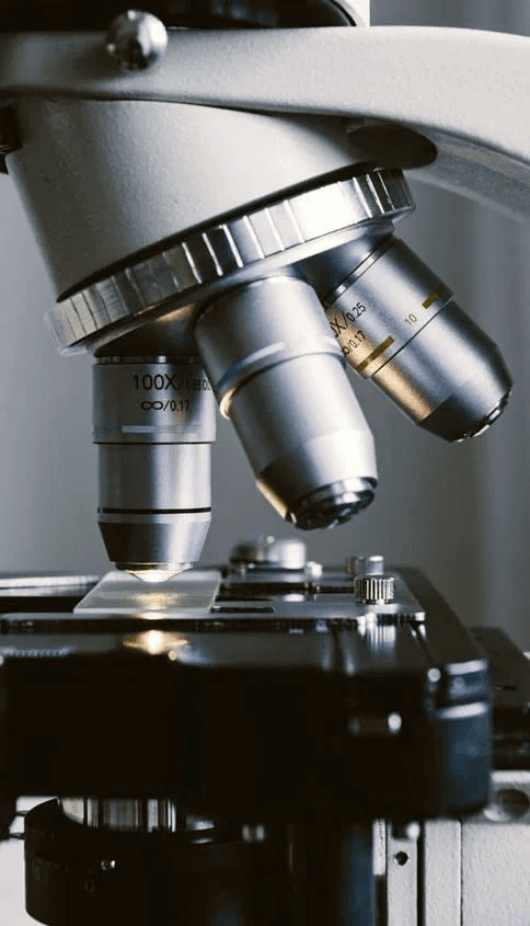 Close-up of a laboratory microscope objective lenses